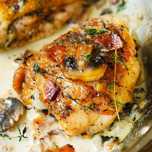 Chicken Thighs With Mushrooms
 Chicken Thighs with Creamy Bacon Mushroom Thyme Sauce