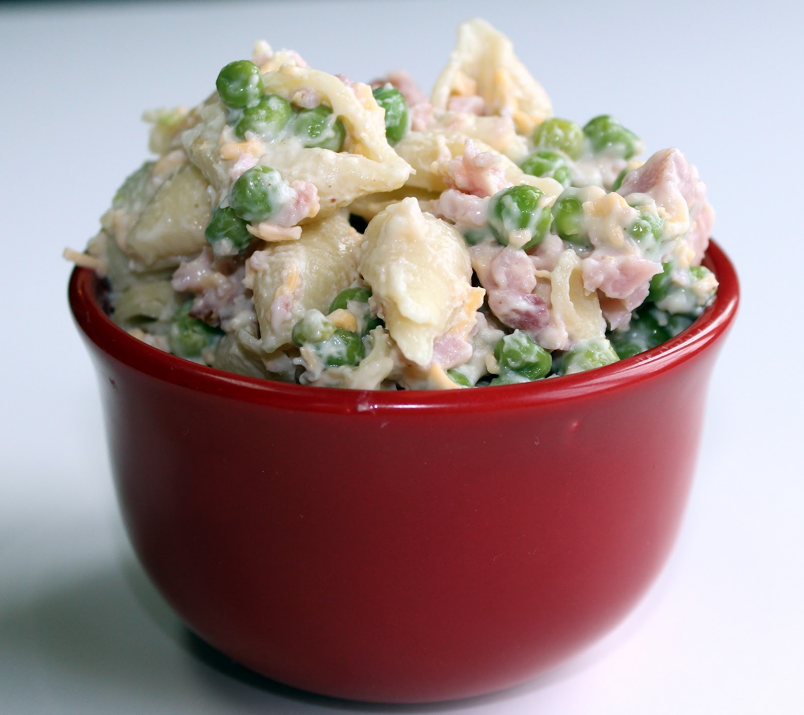 Cold Macaroni Salad With Cheese Cubes
 pasta salad with peas and cheese