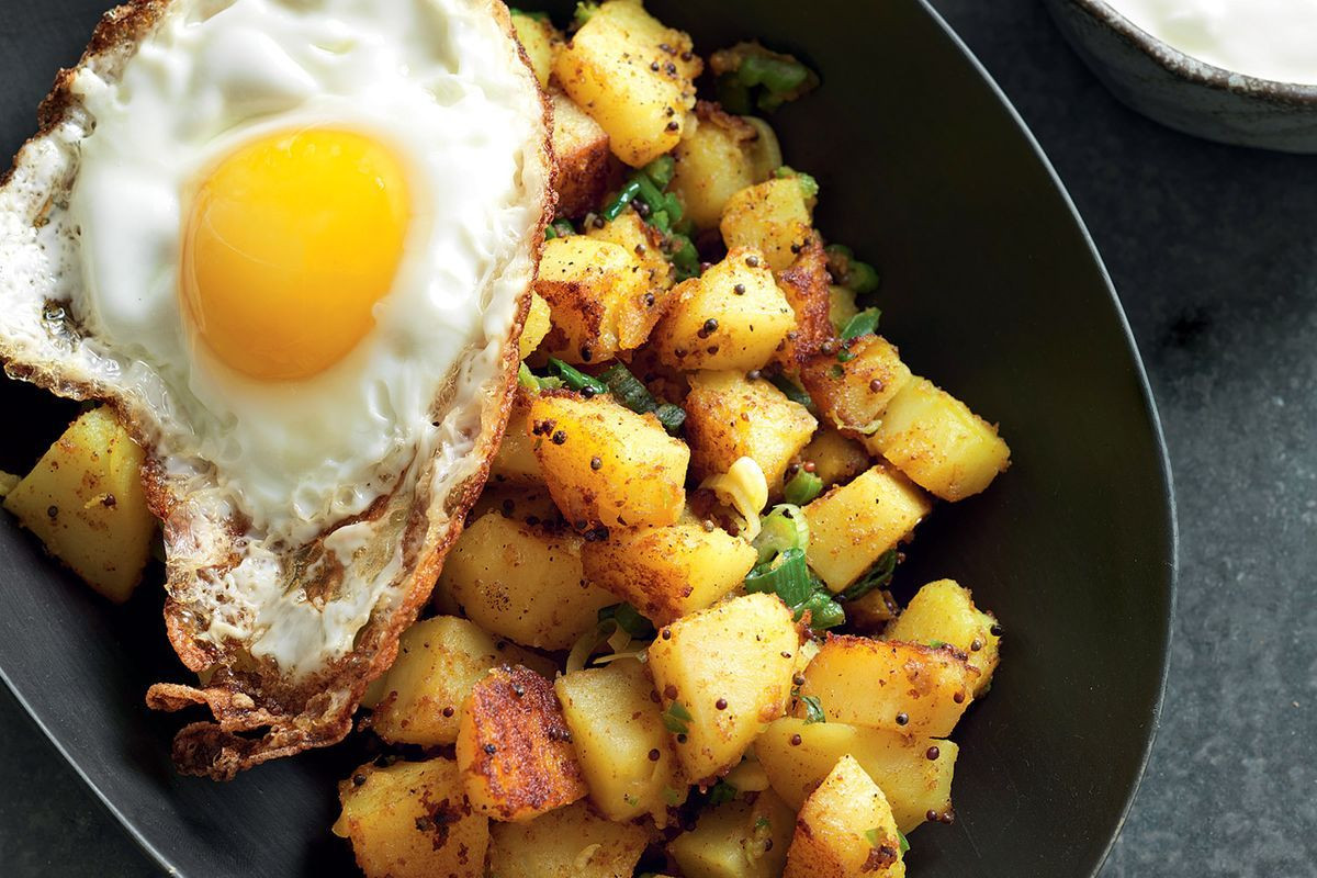 Eggs And Potato Breakfast
 Indian spiced potatoes with fried egg Recipes