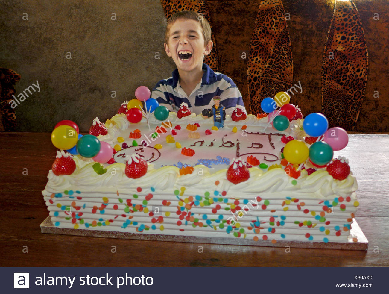 Giant Birthday Cake
 child with giant birthday cake Stock Alamy
