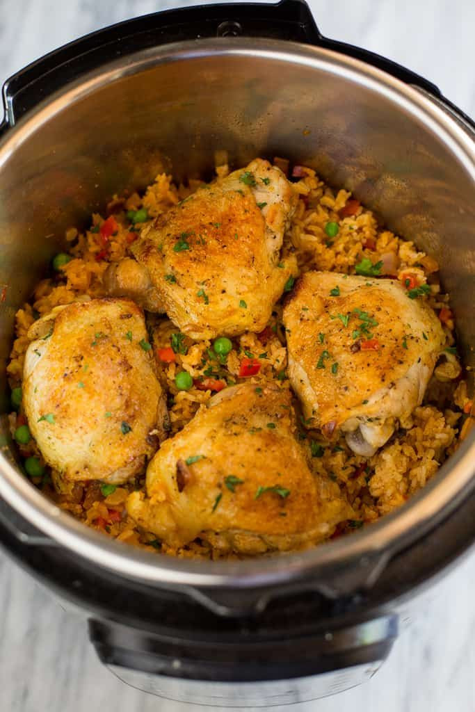 One Pot Chicken Thighs And Rice
 Instant Pot Chicken and Rice Recipe