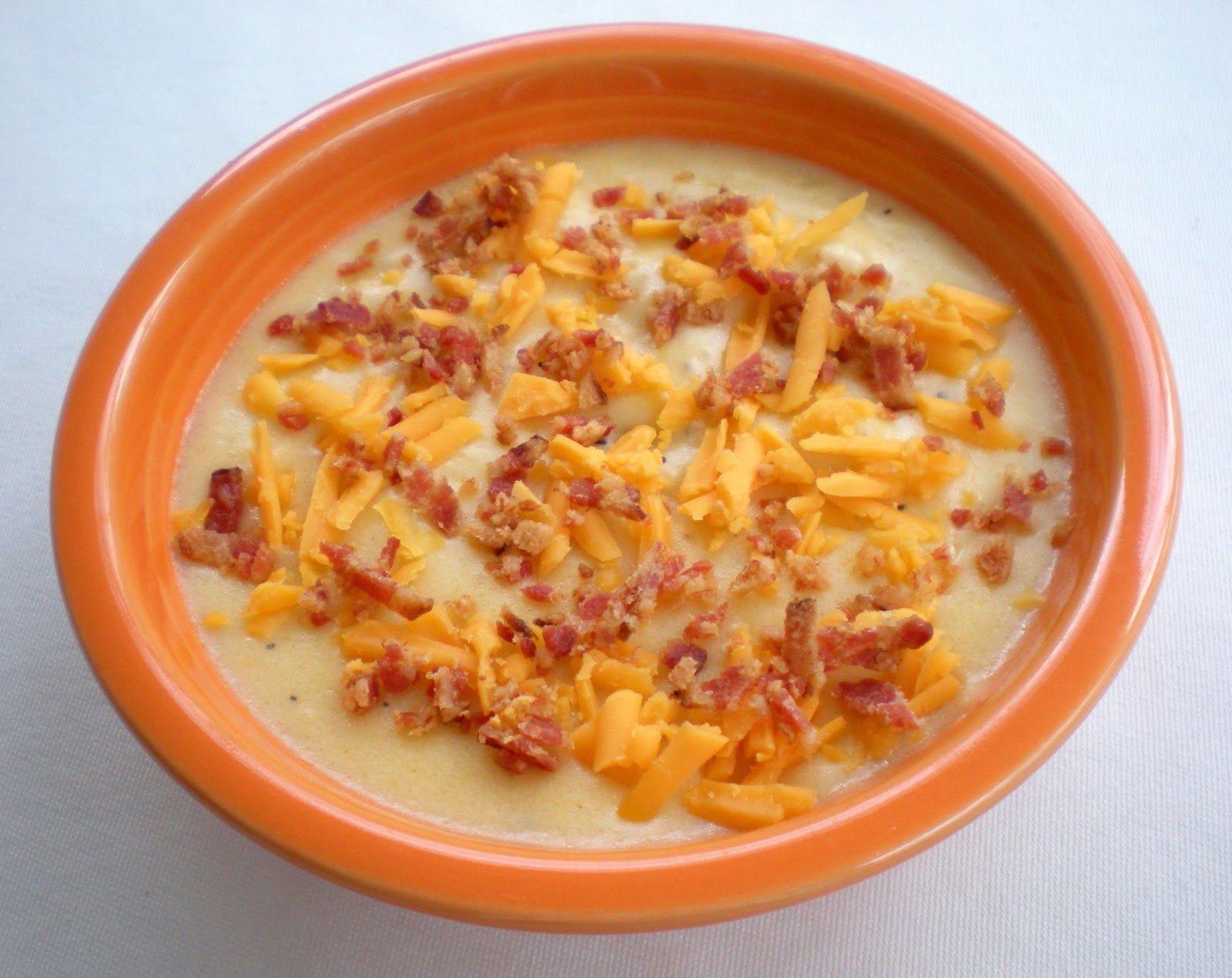 Potato Bacon Cheese Soup
 A Cook and Her Books Baked Potato Soup with Cheese and Bacon