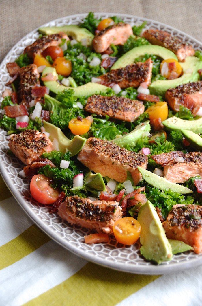 Salmon And Salad
 Spicy Herbed Salmon Salad with Kale Bacon and Avocado