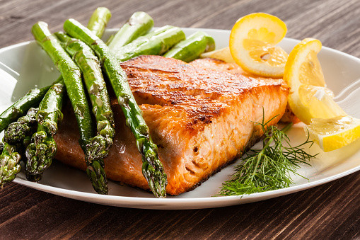 Salmon With Asparagus
 Grilled Salmon With French Fries And Asparagus Stock