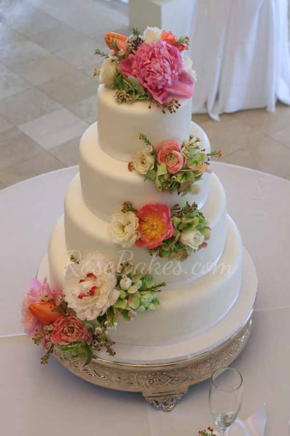 Wedding Cakes With Flowers
 White Wedding Cake with Cascading Fresh Flowers