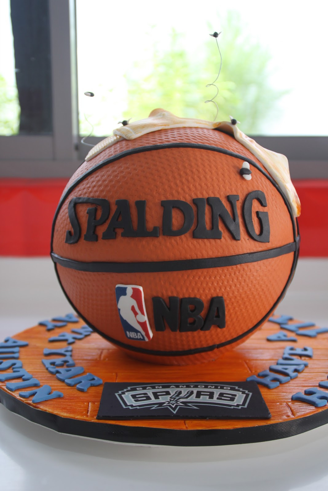 Basketball Birthday Cake
 Sculpted Basketball Cake with Socks