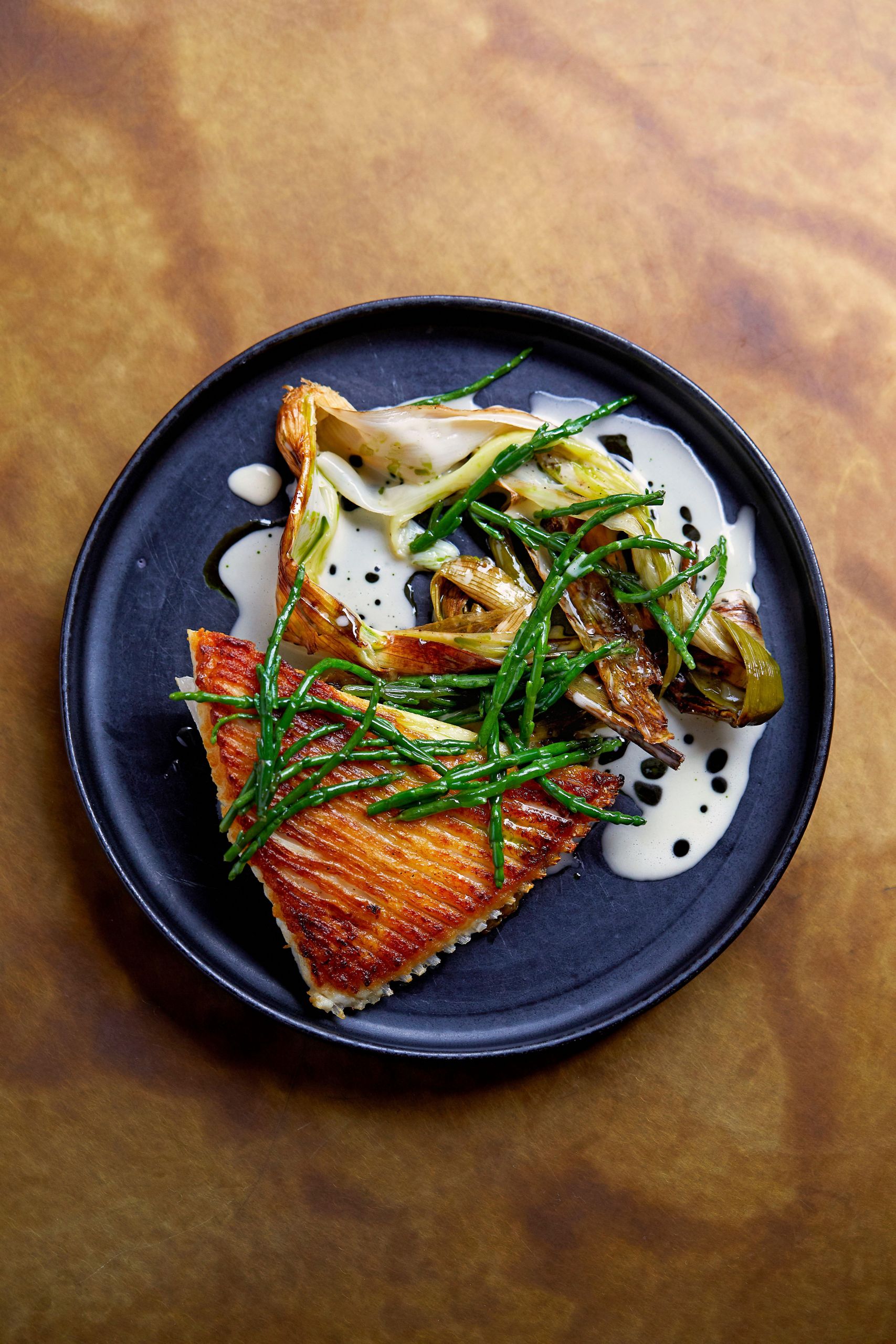 Skate Fish Recipes
 Roasted skate wing with charred leeks and samphire